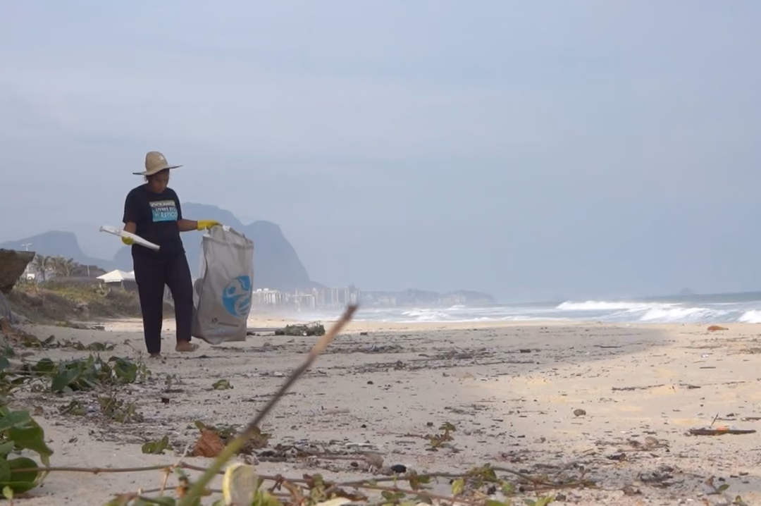 Collectors intercepting ocean-bound plastic along the coast of Rio de Janeiro